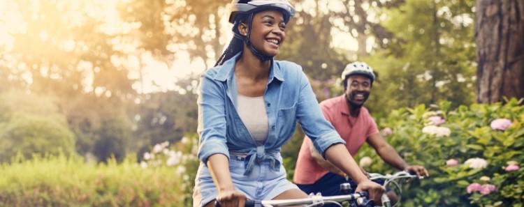 Couple riding bicycles together